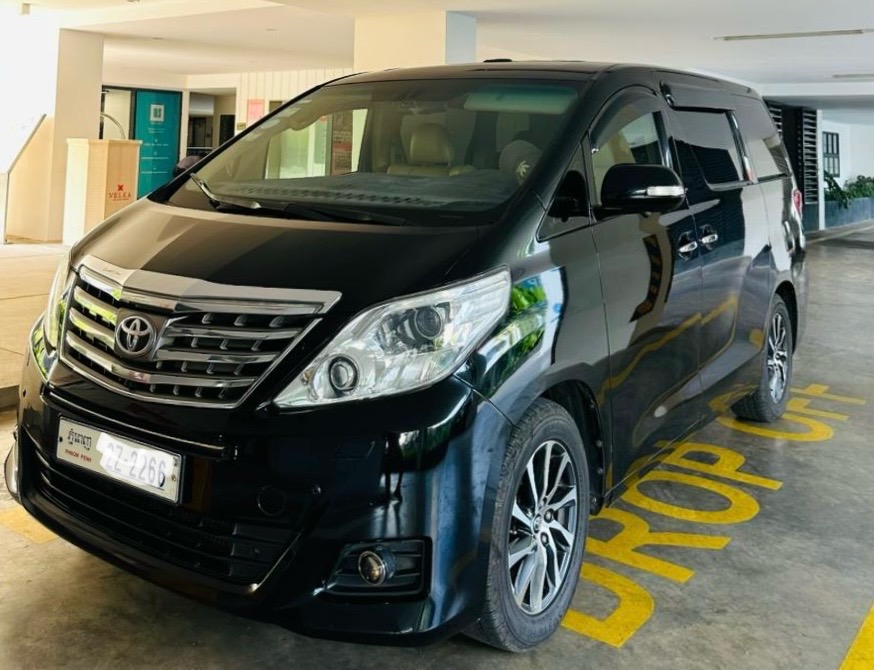 Black Toyota Alphard luxury minivan for VIP private transfers in Phnom Penh.