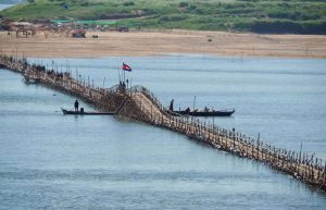 The famous seasonal bamboo bridge in Kampong Cham, Cambodia, accessible via Phnom Penh Taxi Drive private transfers.