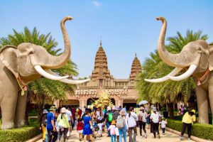 The grand entrance of Phnom Penh Safari World featuring giant elephant statues; book your family day trip with Phnom Penh Taxi Drive.