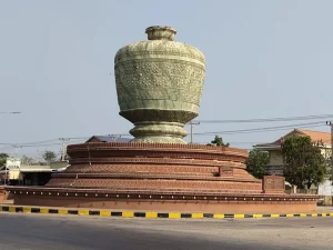 The famous Pursat Marble Vase roundabout in Pursat City, Cambodia, on a private taxi route with Phnom Penh Taxi Driver.