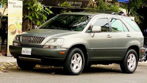 Silver Lexus SUV taxi for private transfers in Phnom Penh, Cambodia.