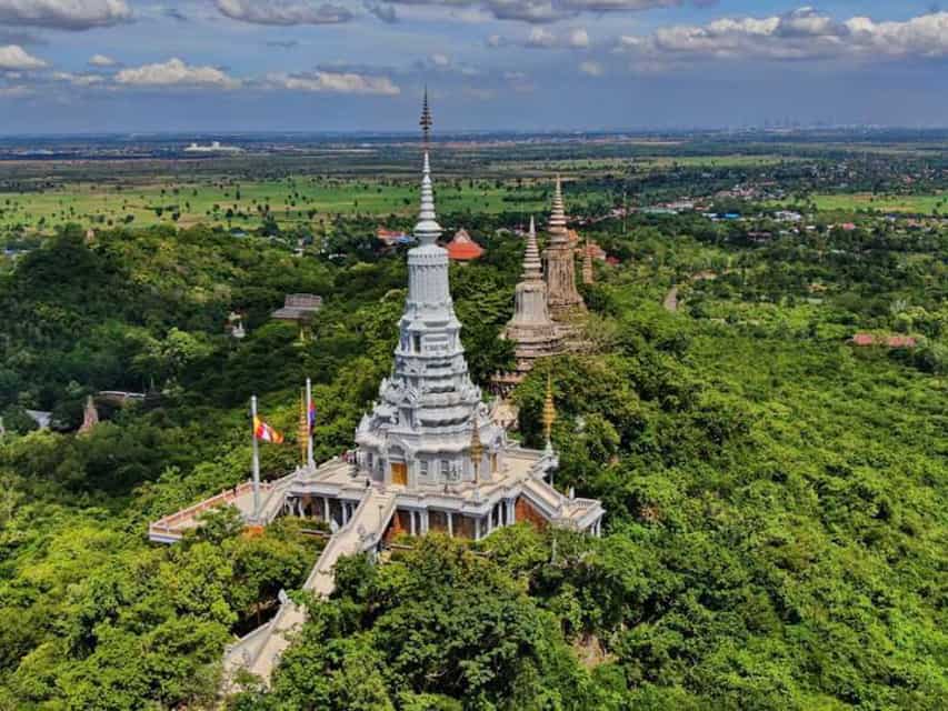 Aerial view of the white silver stupa at Oudong Mountain temple in Cambodia