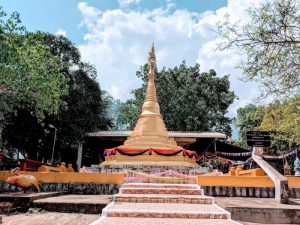 The golden Yey Yat Shrine at Phnom Yat, Pailin, a top cultural landmark visited on private tours by Phnom Penh Taxi Driver.