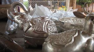Handcrafted silver elephant and traditional bowls at the Silver Village in Kampong Luong Cambodia