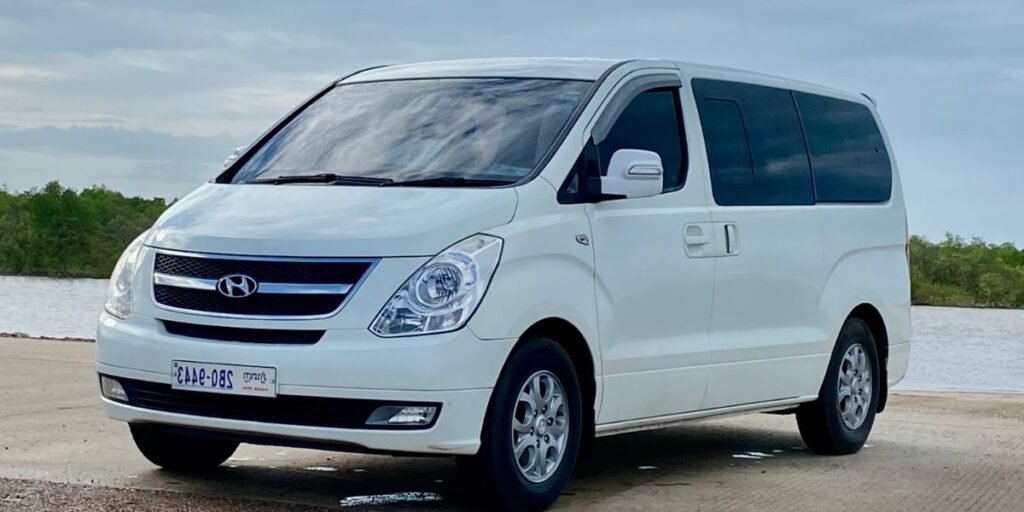 White Hyundai Starex van for private group transfers in Phnom Penh, Cambodia.