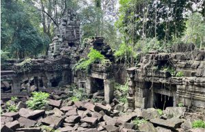 Ancient stone ruins and overgrown towers of Banteay Chhmar Temple in Banteay Meanchey Cambodia
